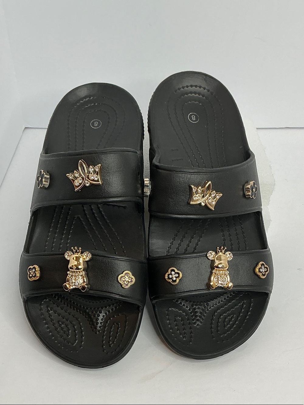 Source Unknown Black Sandals with Gold Embellishments (missing one charm)
